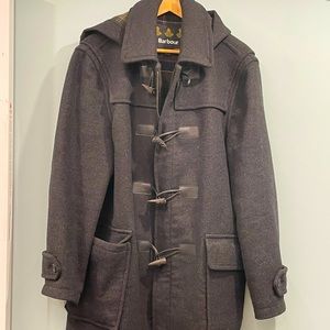 Never worn. Barbour jacket with hood.